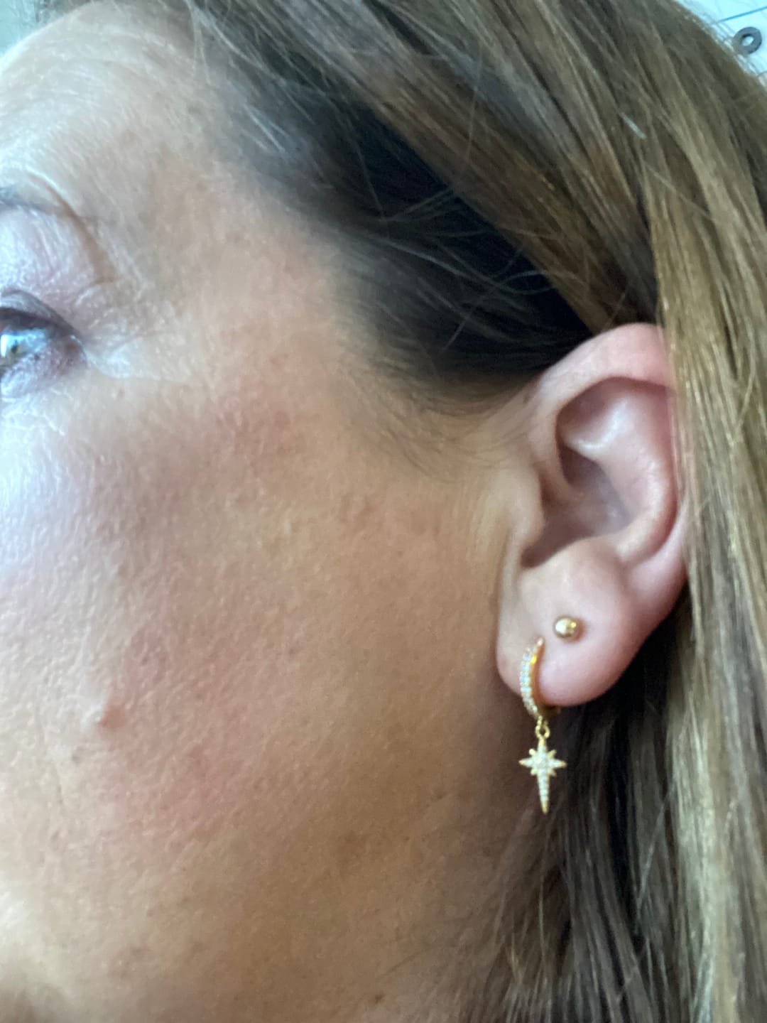 Customer photo review of North Star Earrings in Gold