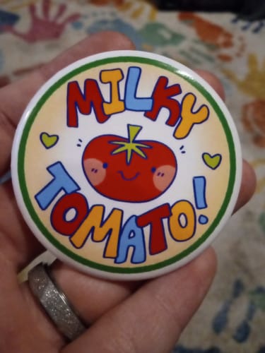 Customer photo review of Milky Tomato Logo Buttons