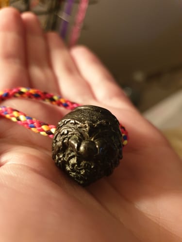 Customer photo review of Perle sacrée alchimique Look Sakot Phra Rahu - protection puissante contre la magie noire.