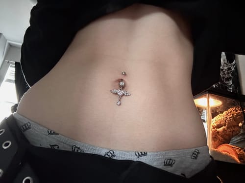 Customer photo review of Bling Angel Wings Belly Button Ring
