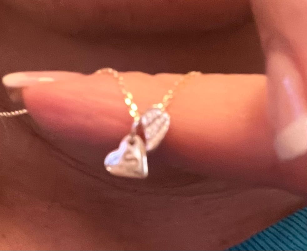 Customer photo review of always near angel wing necklace