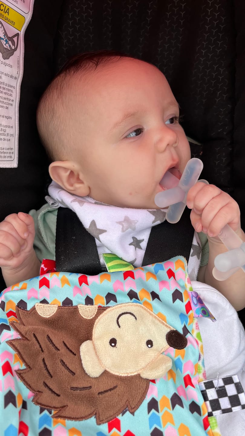 Customer photo review of The best baby teether: 1-pack clear silicone teether