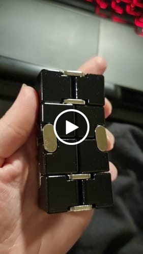 Customer video review of BLACK Metal Infinity Cube Fidget - 214 grams