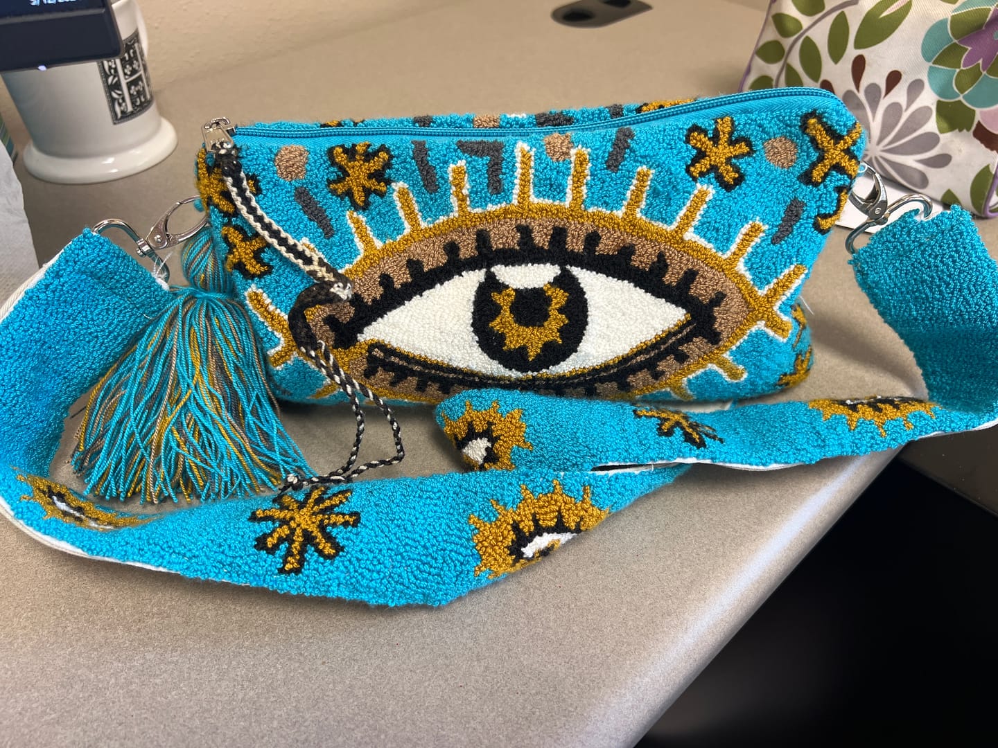 Customer photo review of Golden Blue Eye Clutch with Strap