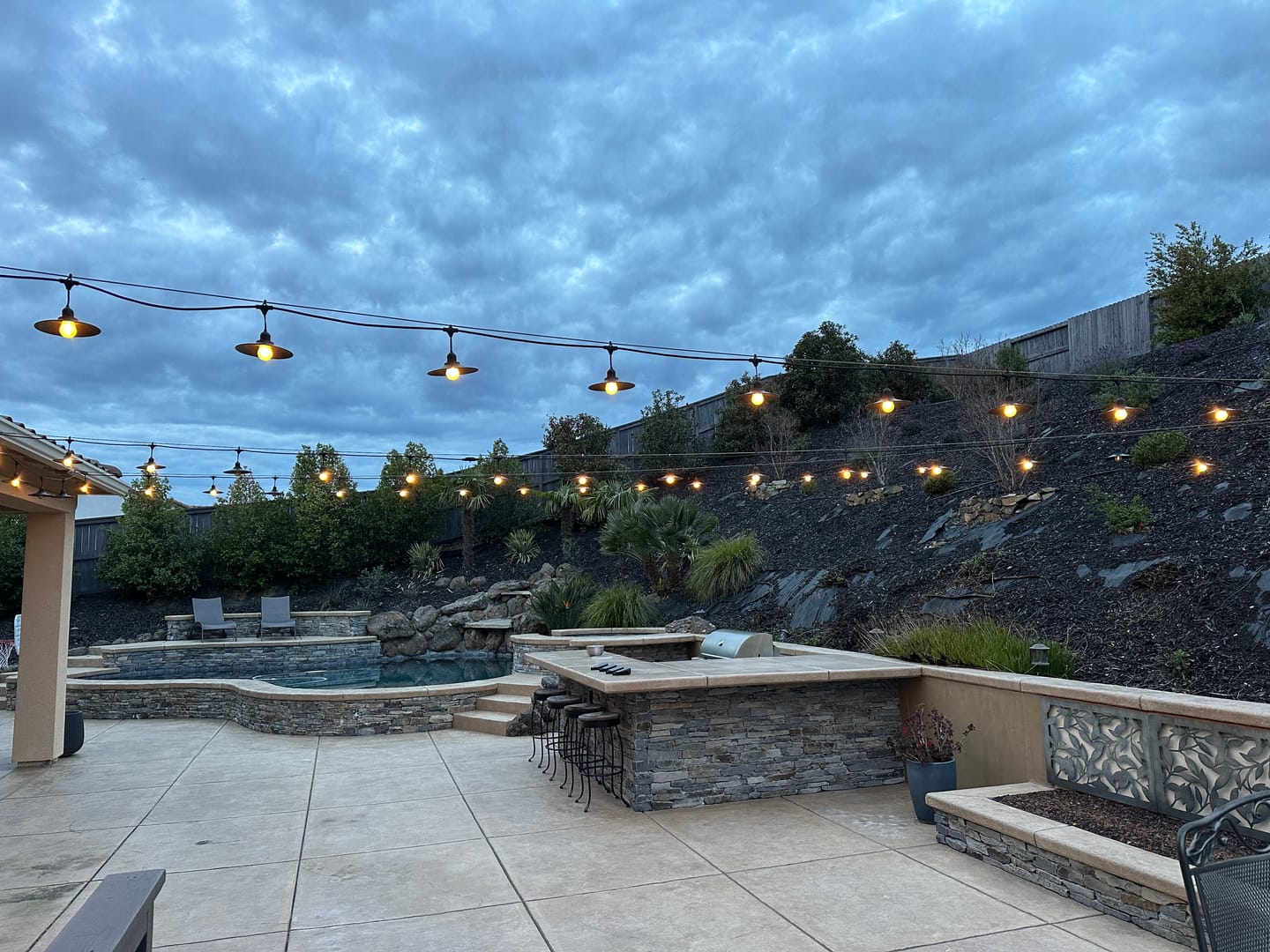 Customer photo review of Classic Metal Patio Light Bulb Shade Cover for Outdoor Commercial String Lights, E26, Black