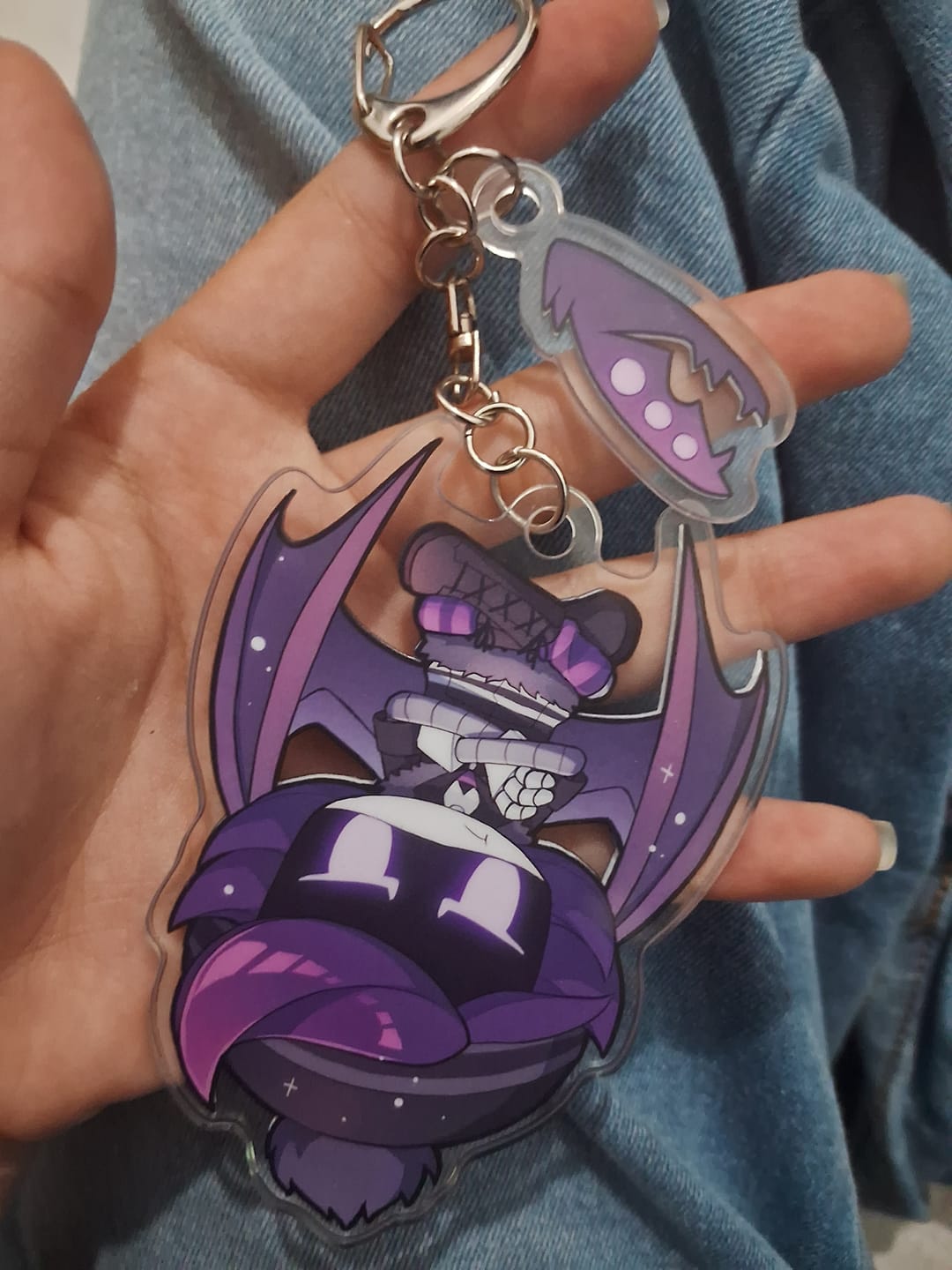 Customer photo review of Uzi Hang Tail Keychain