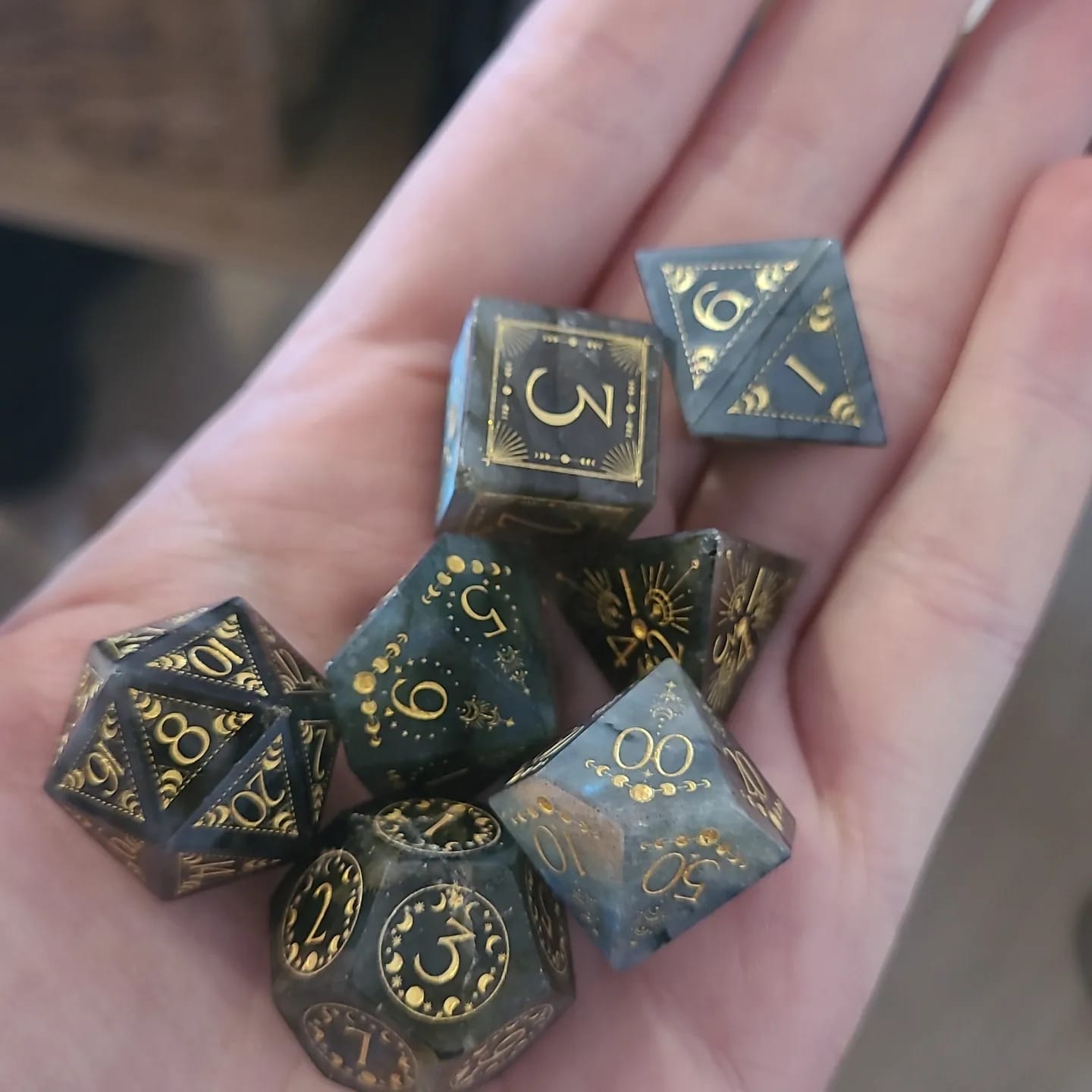 Customer photo review of URWizards D&D Labradorite Engraved Dice Set Lunar Eclipse