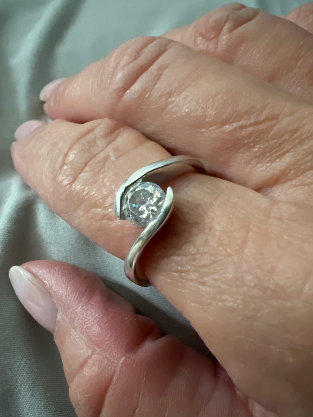 Customer photo review of Solitaire Tension Set Moissanite Bypass Engagement Ring