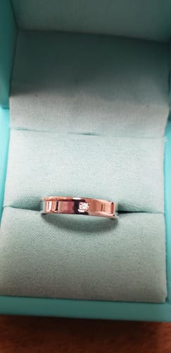 Customer photo review of Moissanite Two Tone Eternity Sterling Silver Wedding Band Ring