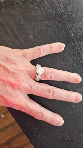 Customer photo review of Round Moissanite Triple Channel Set Engagement Ring