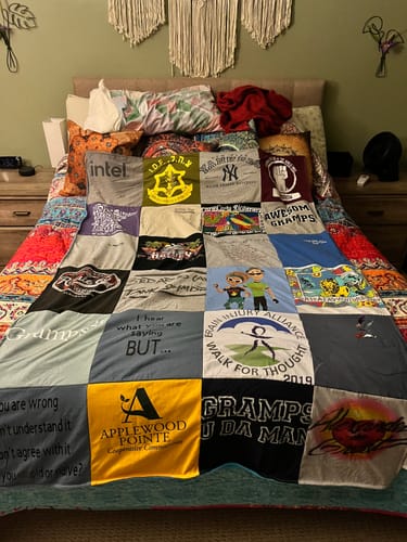 T-shirt quilt with family, community service themes by Marci from MN