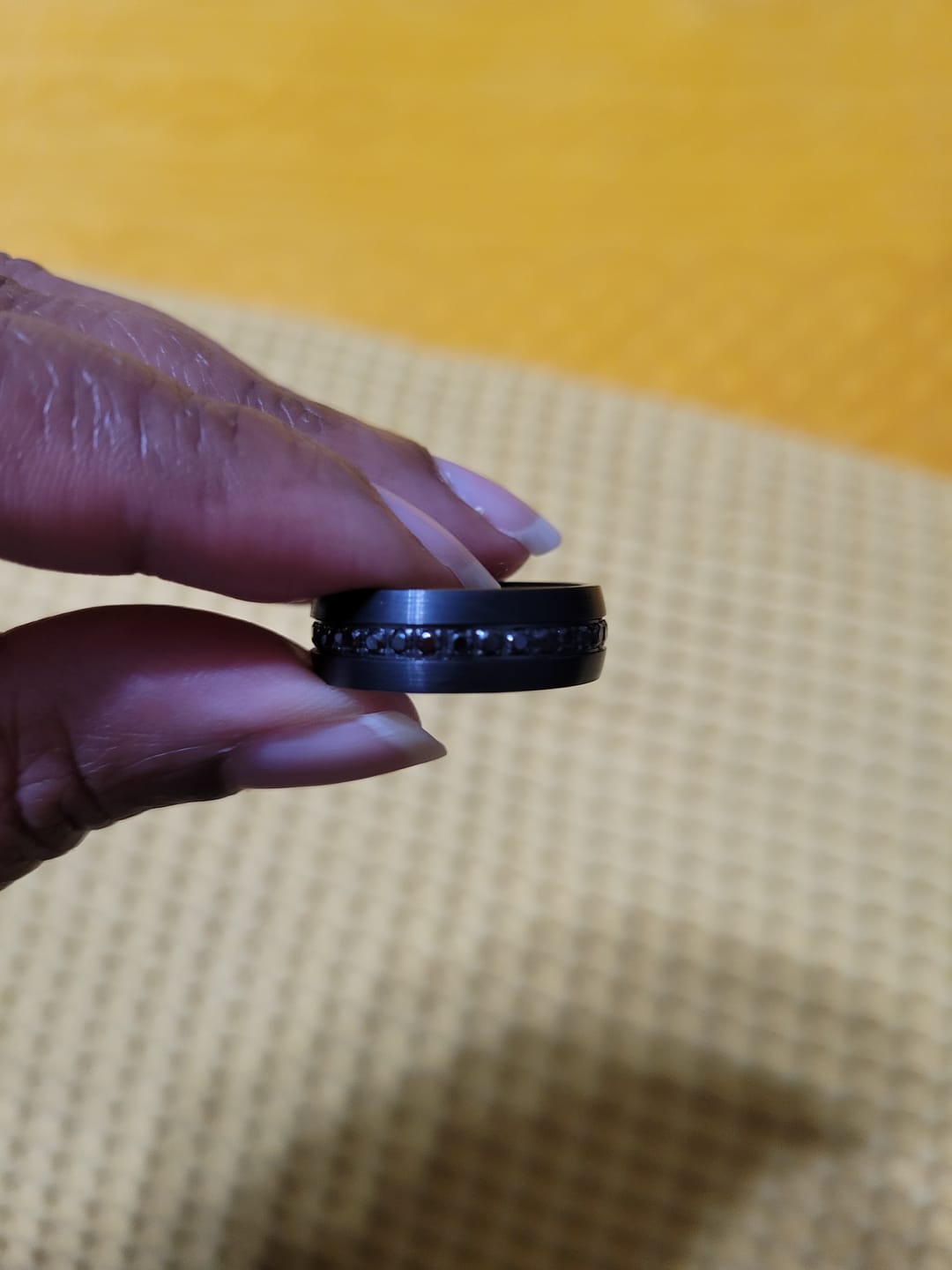 Customer photo review of 8mm Black Tungsten Wedding Band with Black Sapphires