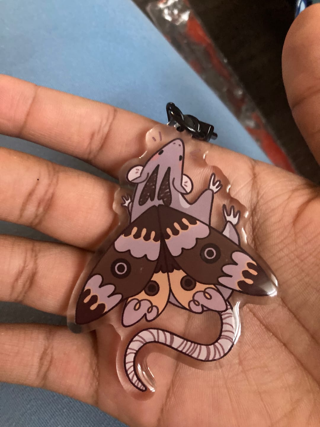 Customer photo review of Mothrat Keychain