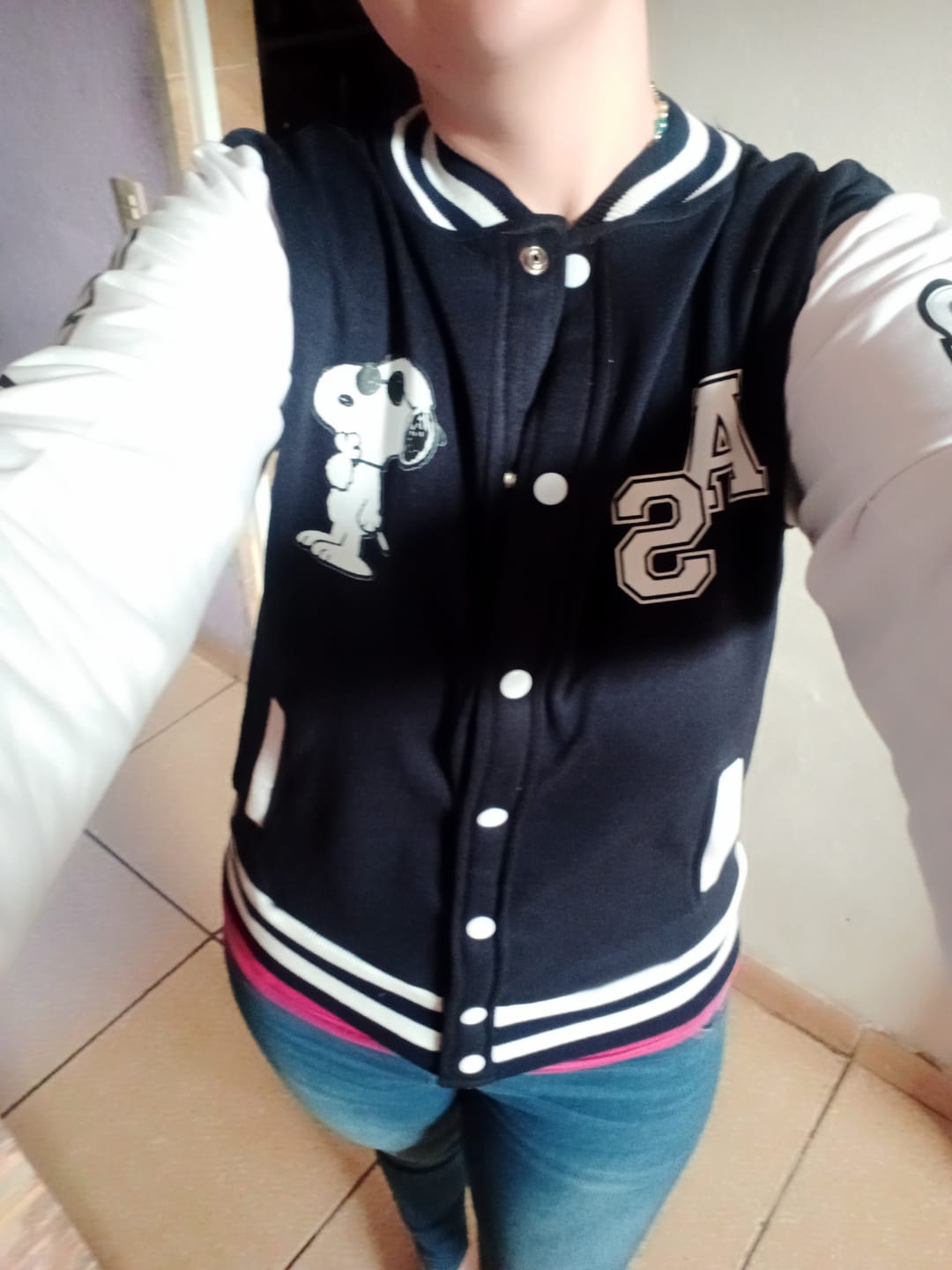Customer photo review of Chamarra Universitaria Snoopy