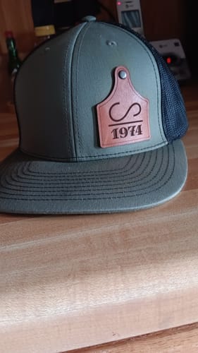 Customer photo review of Ear Tag Custom Leather Patch Trucker Hat - Richardson 112