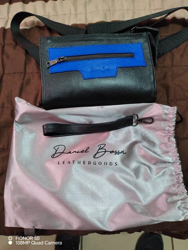 Jesús P. review of Clutch Vallarta Negro Con Azul image 1 out of 1