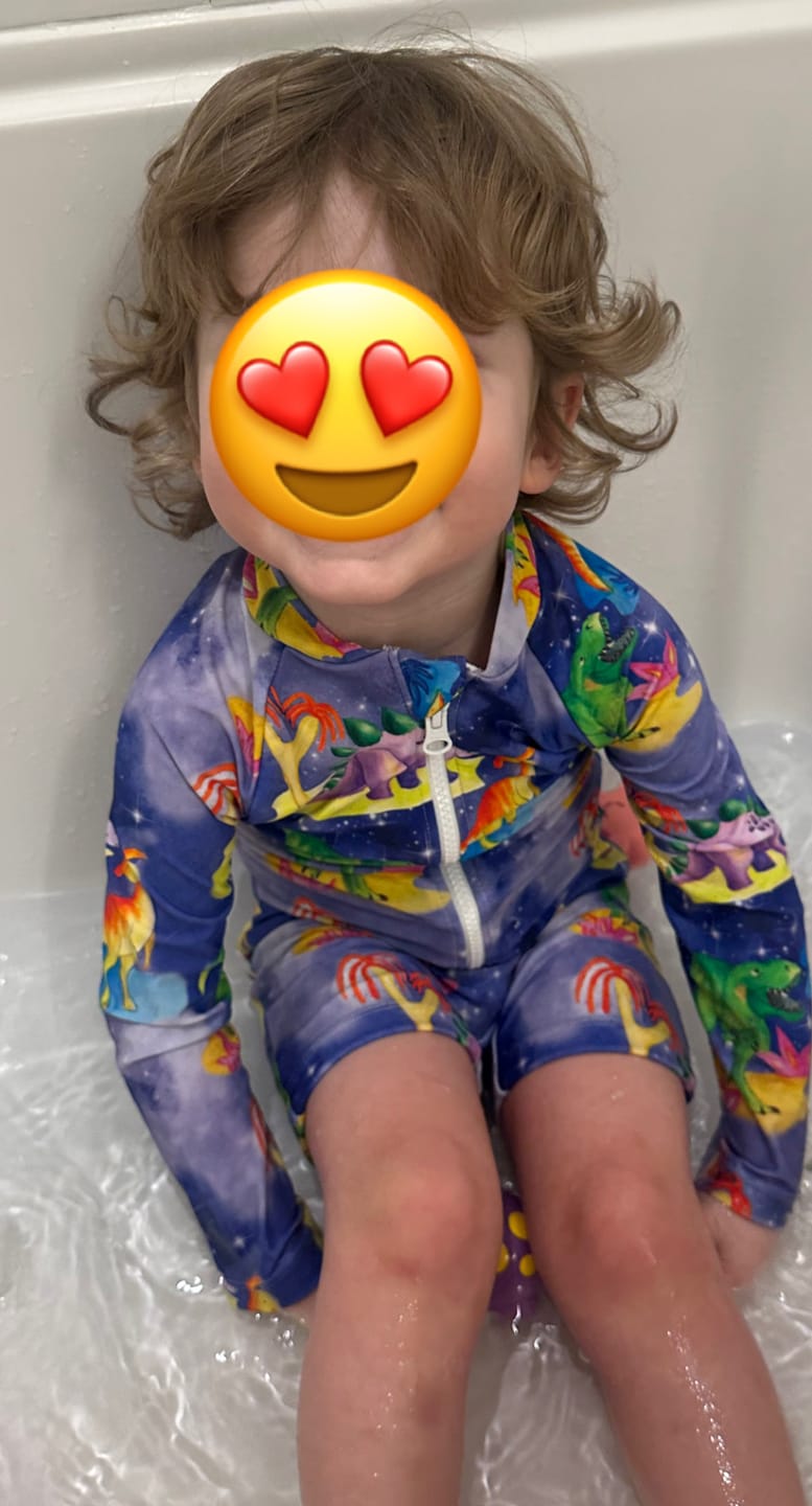 Customer photo review of Space Dinosaurs Unisex Long Sleeve Zip Swimmers