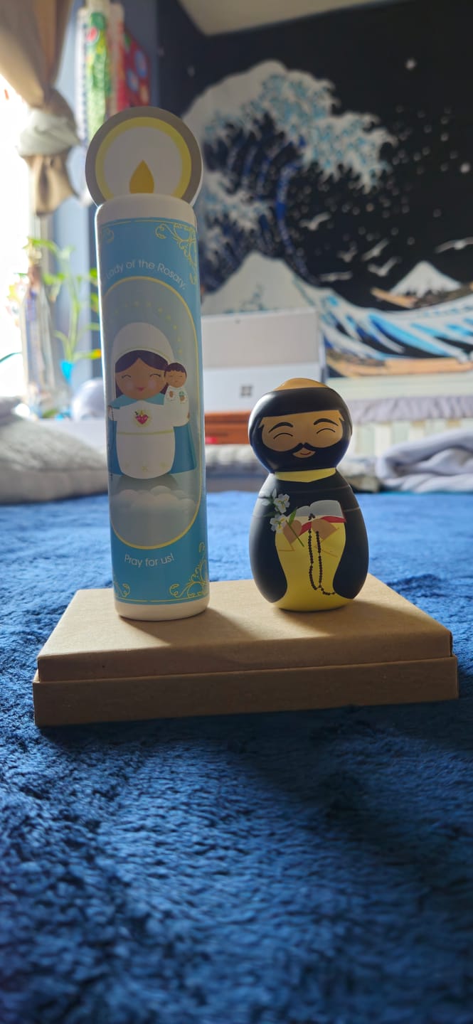 Customer photo review of Our Lady of the Rosary (Hail Mary) Wooden Prayer Candle