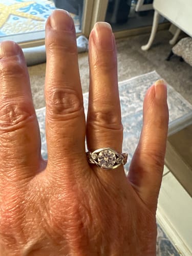 Customer photo review of Bezel Set Round Moissanite Scroll Accents Engagement Ring