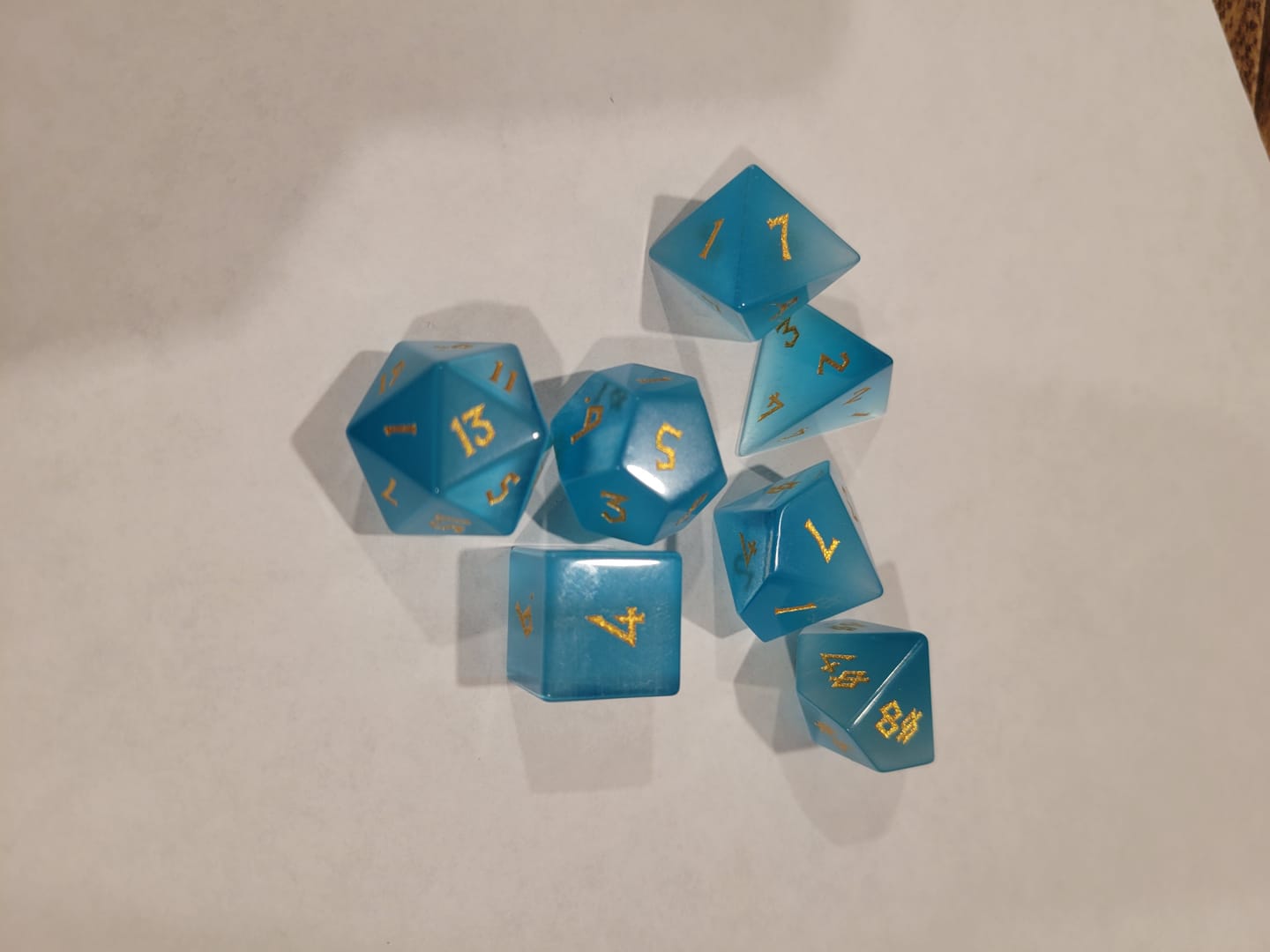 Customer photo review of Aqua Blue Cat's Eye Stone Dice Set