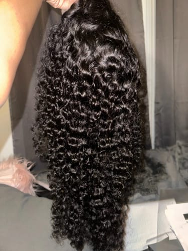 Customer photo review of Wear Go 5x5 Pre Cut Lace Closure Wig Bouncy Water Wave Glueless Wig 150%/180% Density