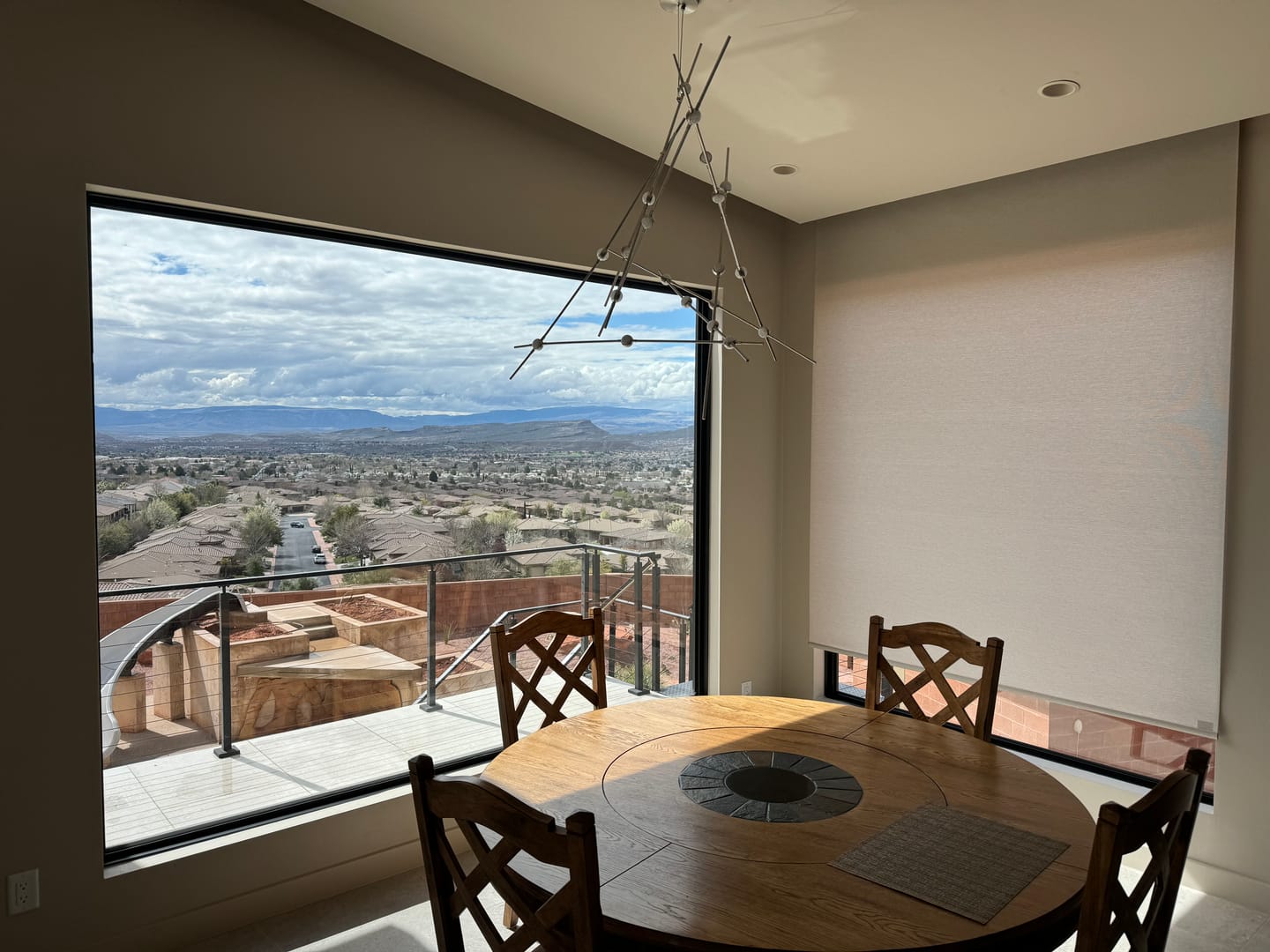 Customer photo review of SmartWings Motorized Light Filtering Roller Shades 70% Blackout Safari