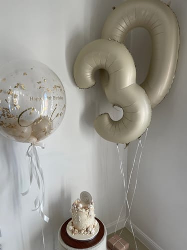 Customer photo review of Inflated Cream Foil Number Balloon