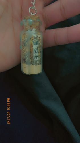 Customer photo review of Spell Jar Keychain