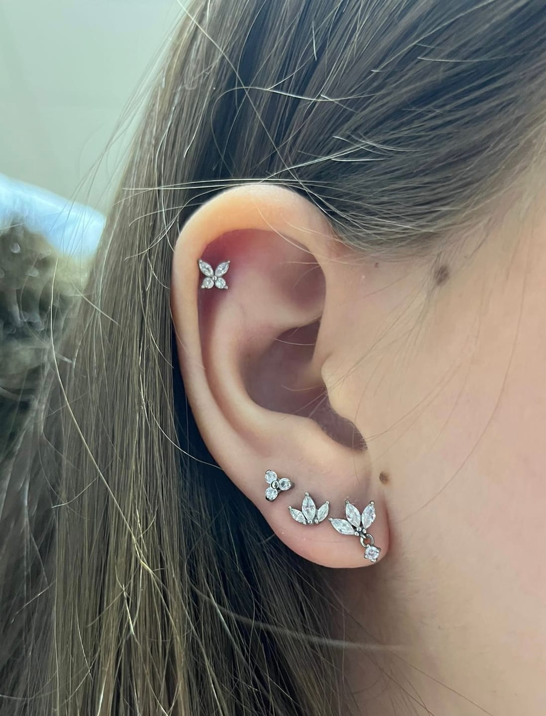 Customer photo review of Butterfly Piercing | Titan
