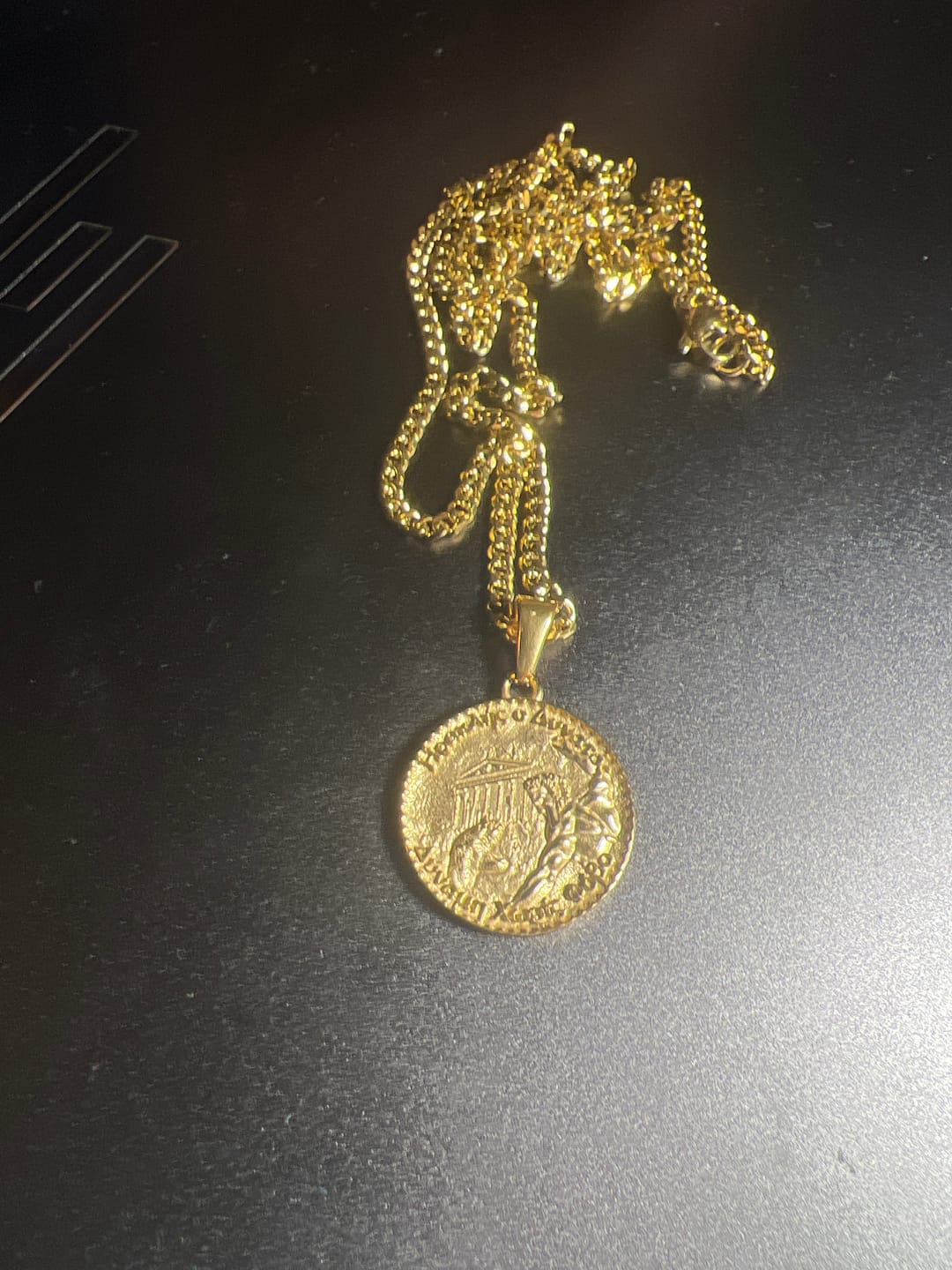 Customer photo review of Hercules Double Sided Coin Pendant - Gold