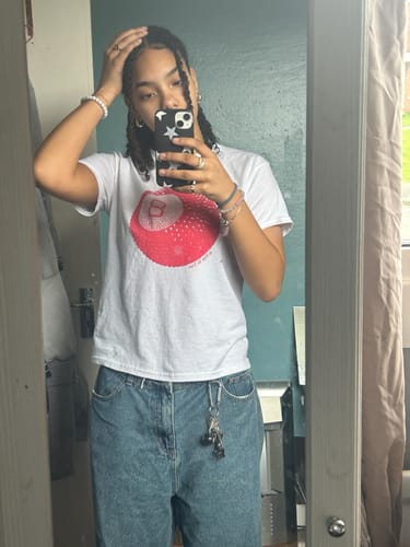 Customer photo review of 'Lucky Shot' baby tee