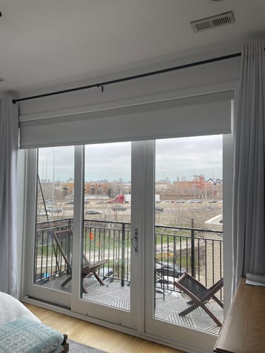 Customer photo review of SmartWings Motorized Roller Shades 100% Blackout Essential
