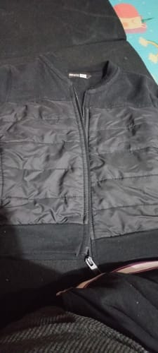 Customer photo review of Kids Parachute Quilted Paneled Black Fleece Jacket Minor Fault