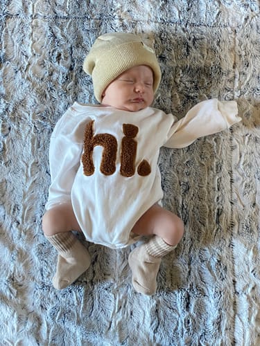 Customer photo review of 'Hi' Embroidered Romper