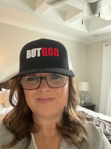 Customer photo review of But God Embroidered Trucker Cap - Christian Hat