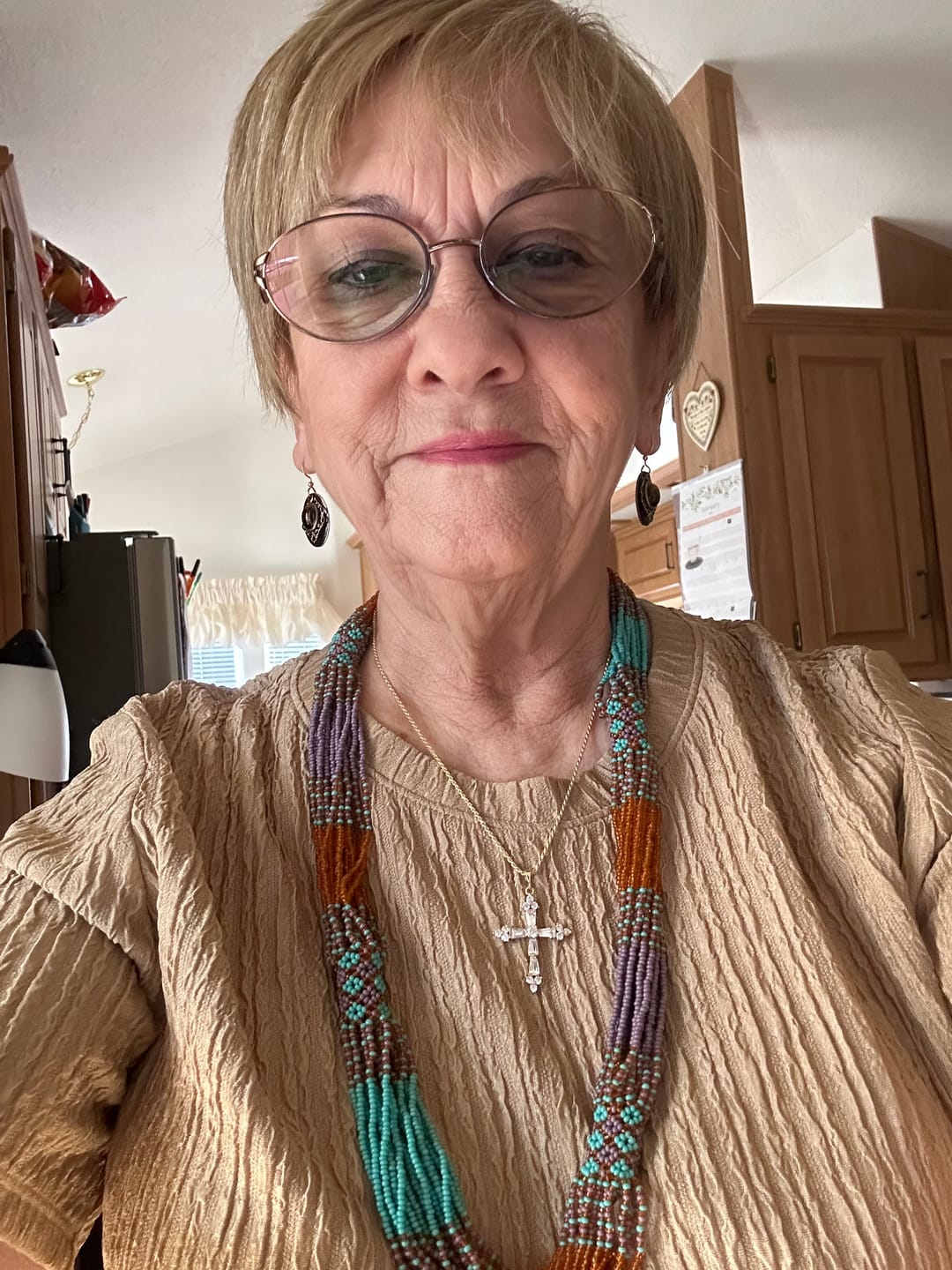 Customer photo review of Queen's Cross Necklace