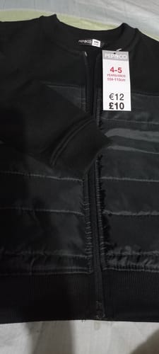 Customer photo review of Kids Parachute Quilted Paneled Black Fleece Jacket Minor Fault
