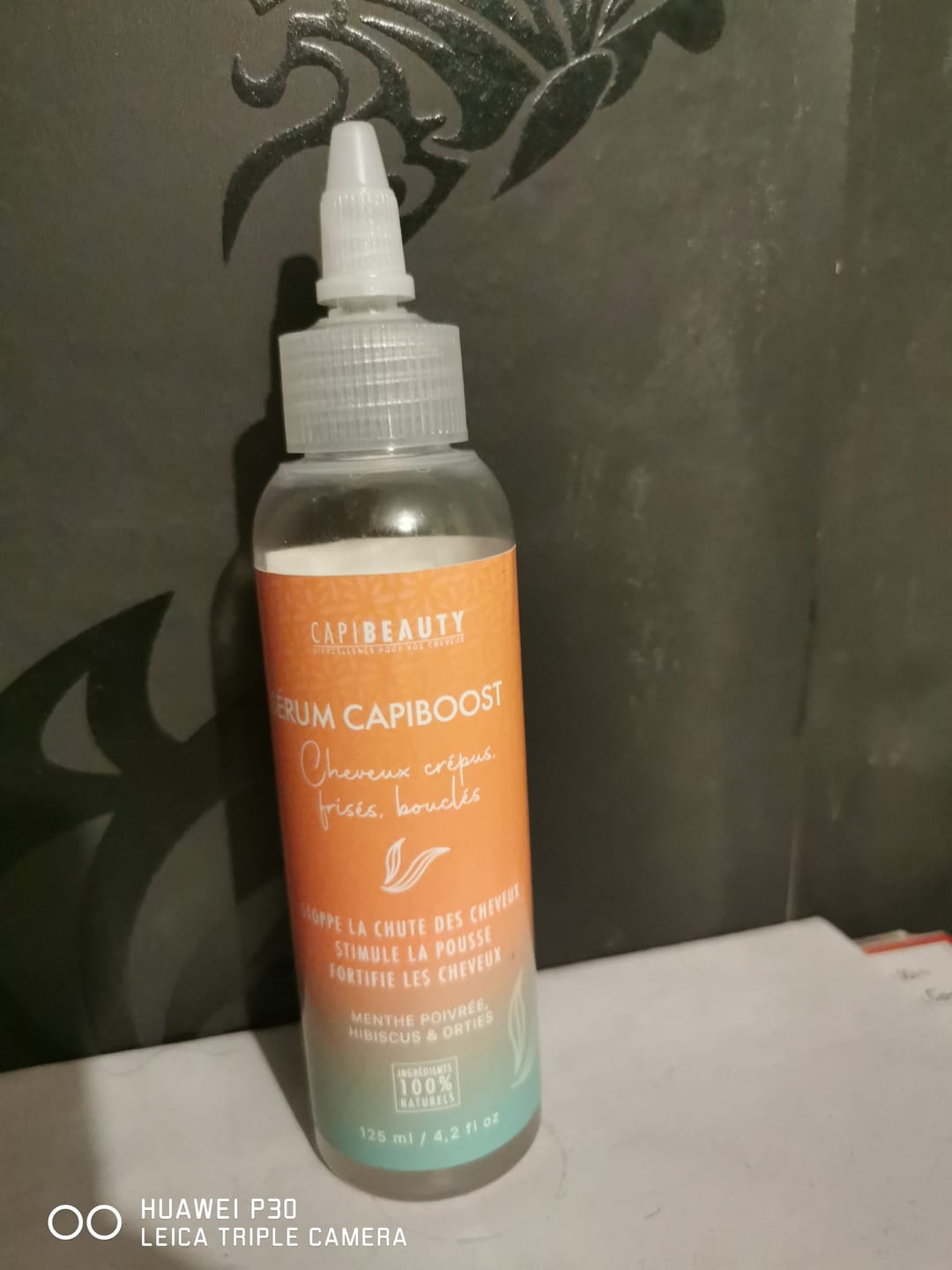 Customer photo review of Sérum Capiboost Hibiscus & Orties 120ml pour la pousse des cheveux bouclés frisés crépus