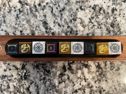 Customer photo review of URWizards Obsidian Raised Plating Number Dice Set Dagger Style