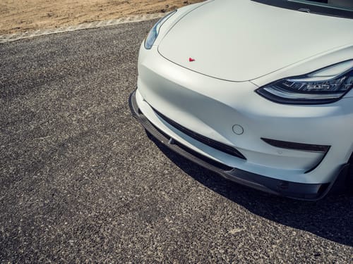 Customer photo review of Genuine Carbon Fiber Front Lip Spoiler for Tesla Model 3 2017-2024