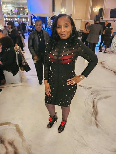 Customer photo review of Mio Black Studded Mesh Bandage Dress
