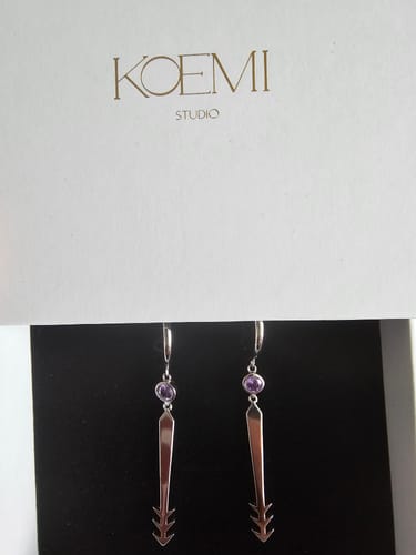 Customer photo review of Blood Manipulation Earrings
