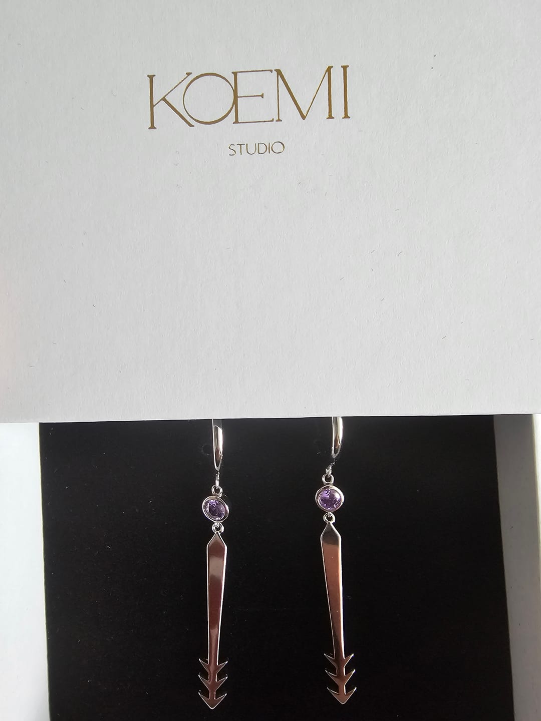 Customer photo review of Blood Manipulation Earrings