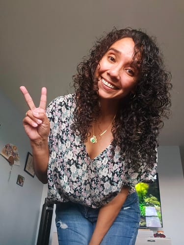 Customer photo review of Neutral Dark Brown Curly Clip-In Hair Extensions