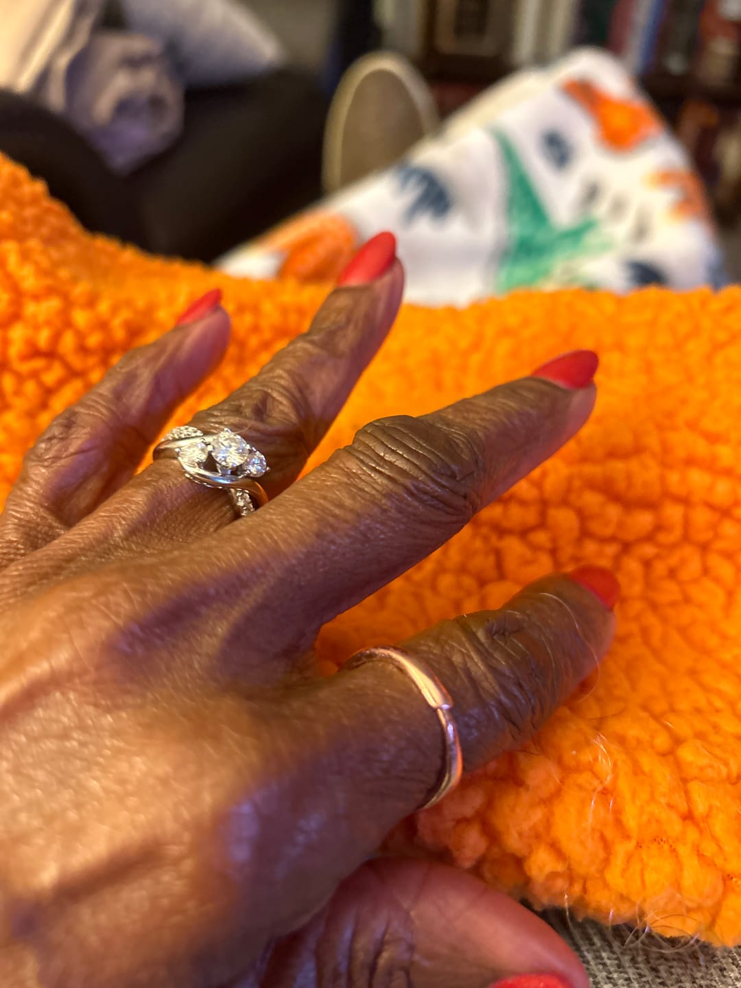 Customer photo review of Swirl Three Stone Moissanite Twisted Pave Engagement Ring