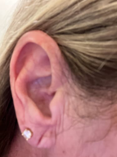 Customer photo review of VVS Moissanite Solitaire Stud Earrings