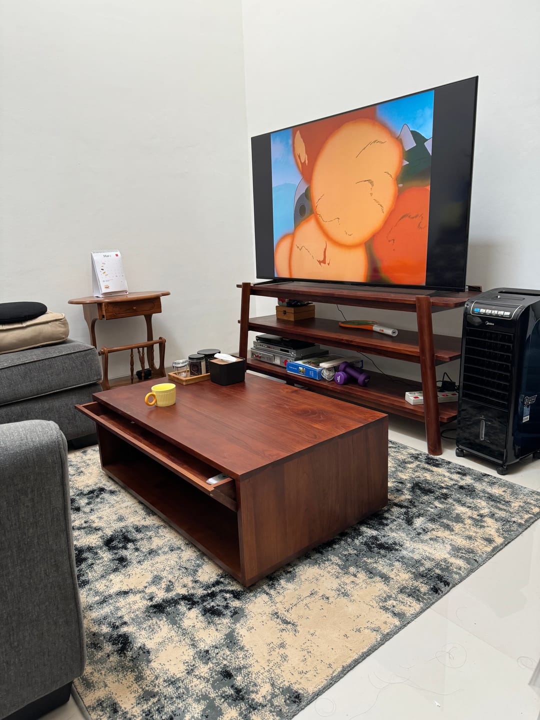Customer photo review of Timeless Teak Coffee Table with Seamless Storage