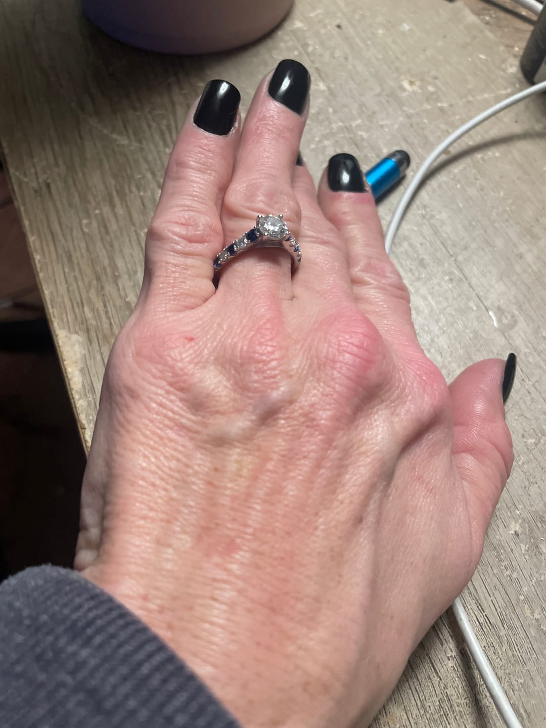 Customer photo review of Round Moissanite With Sapphire Pave Engagement Ring