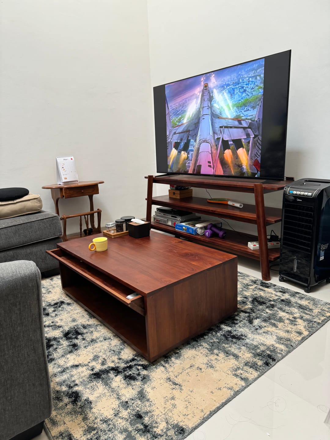 Customer photo review of Timeless Teak Coffee Table with Seamless Storage