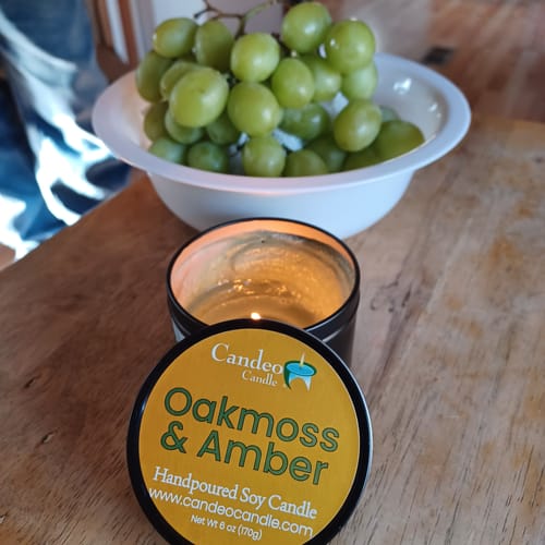 Customer photo review of Oakmoss & Amber, 6oz Soy Candle Tin